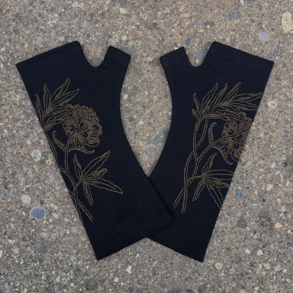 Black fine merino wool fingerless gloves with a bronze peony print, handmade in Dunedin New Zealand by Kate Watts.
