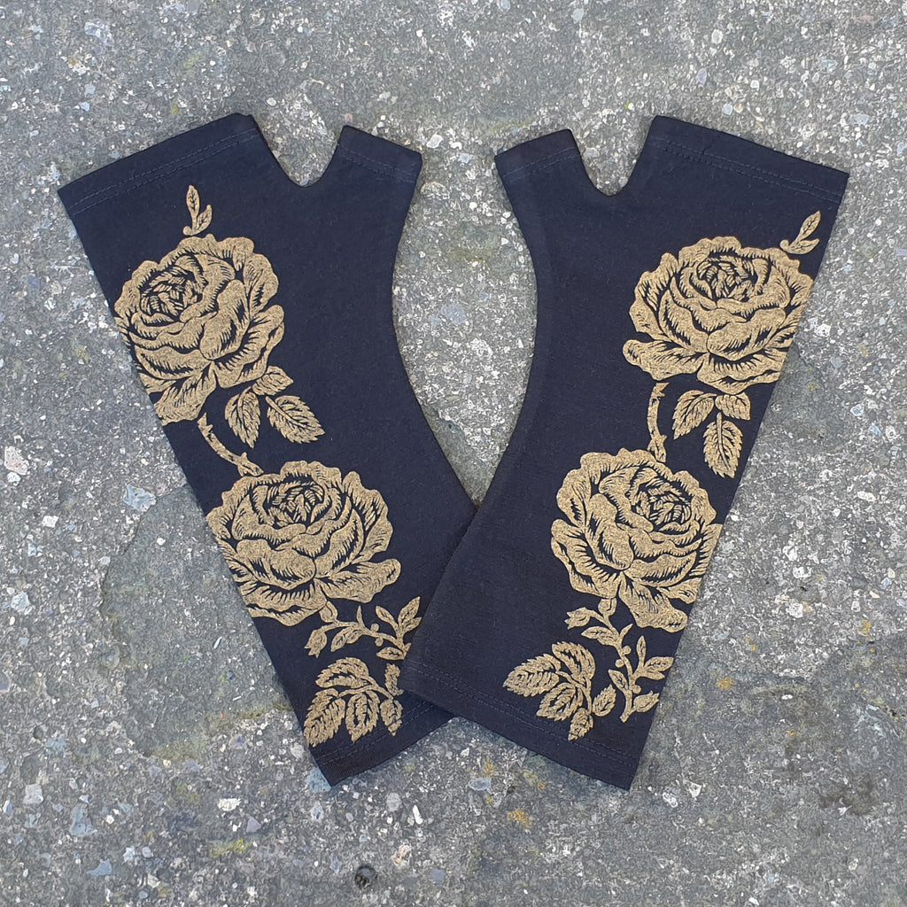 Women’s black winter fine merio wool fingerless mittens, perfect for cold weather. Dunedin made black and  floral print evening arm warmers. All of our orders come gift wrapped.