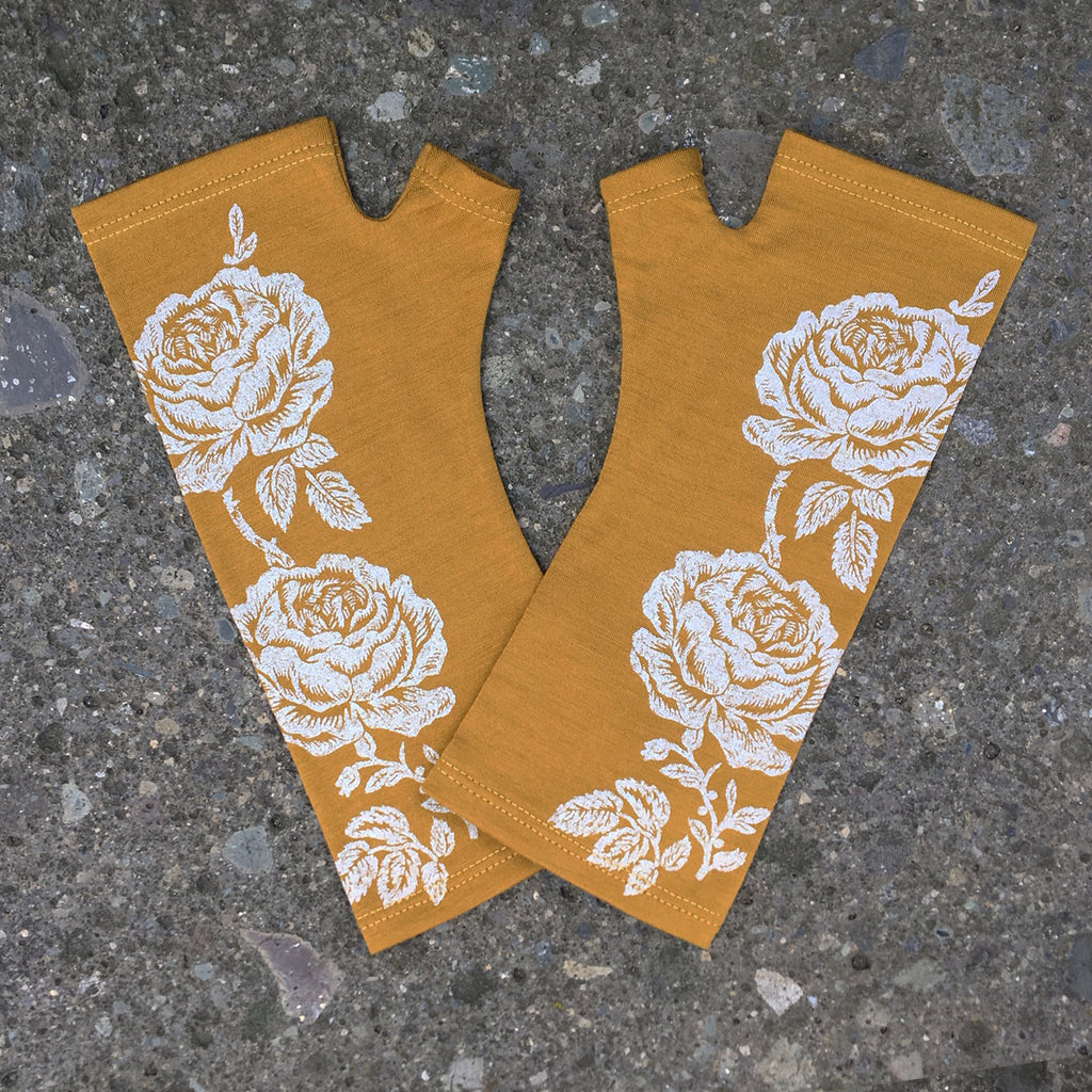 Mustard yellow merino fingerless gloves with rose print, handmade in Dunedin New Zealand by Kate Watts.