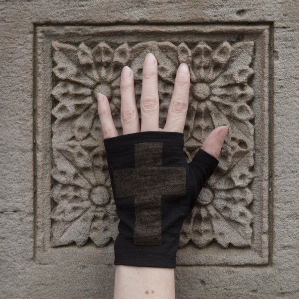 Short black merino wool fingerless gloves with a bronze gothic cross print, handmade in Dunedin New Zealand by Kate Watts.