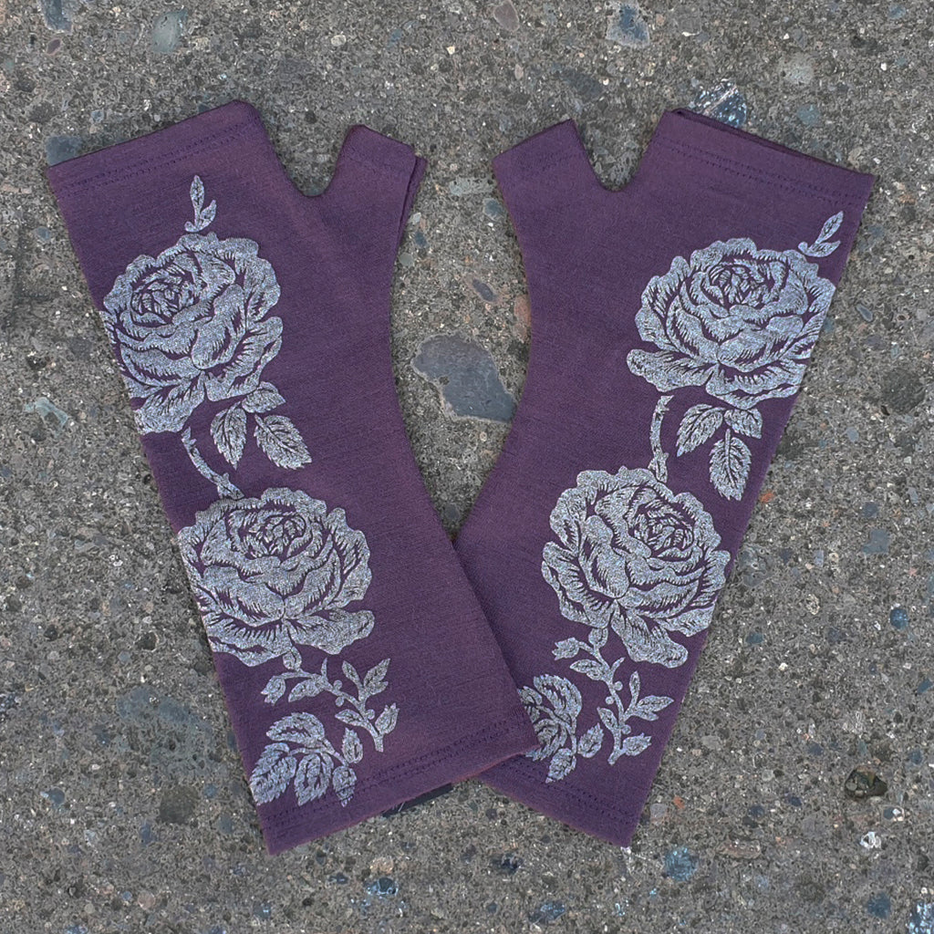 Purple merino fingerless gloves with a rose print, handmade in Dunedin New Zealand by Kate Watts.